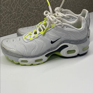 Nike White and Neon Yellow Sneakers

I wear a 7.5 and they fit me well.